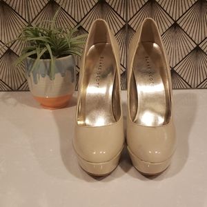 Cream platform pumps